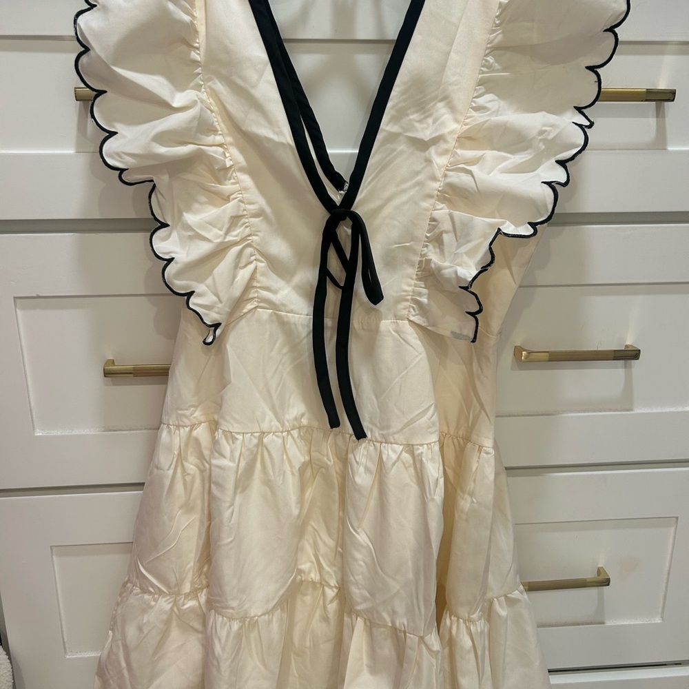 Cream Ruffle Dress with Black Trim